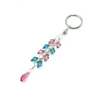 4 1/8" (10.5cm) in length from the top of the keyring