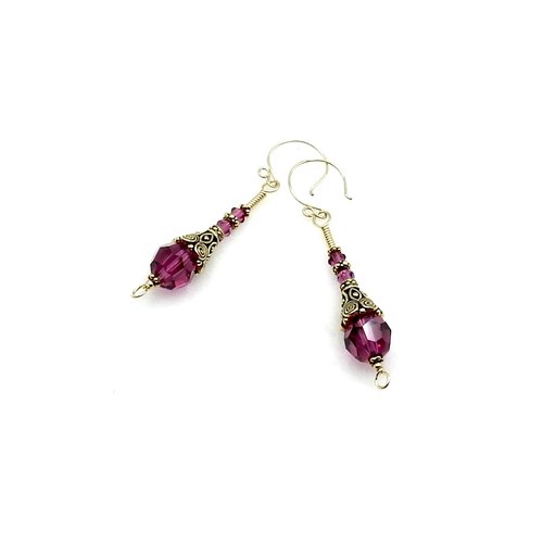 2 3/8" (6cm) in length from the top of the ear wires