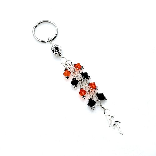4 5/8" (11.7cm) in length from the top of the keyring