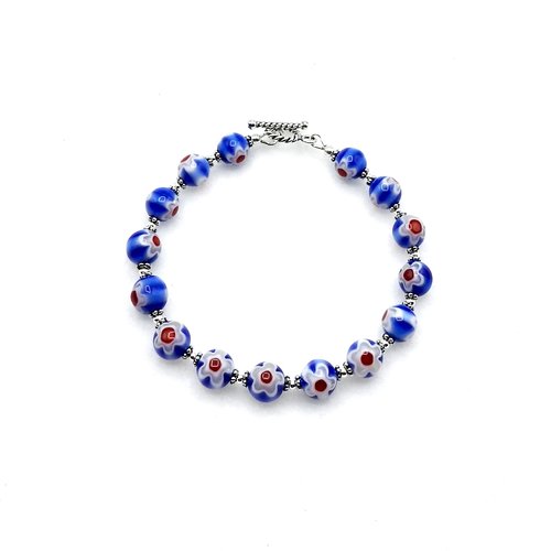 two tone blue with white flower and red centre accent