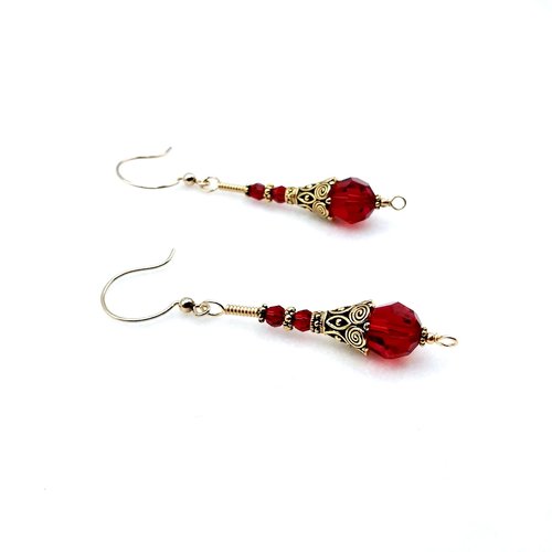 2.5" (6.4cm) in length from the top of the gold round pierced ear wires 